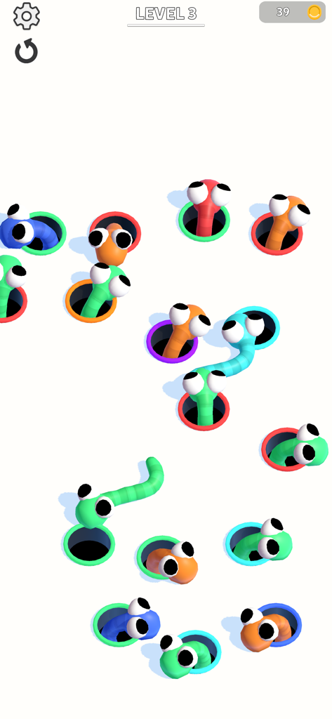 Hole Worm - Gameplay of Hole Worm showing cute colorful worms matching with colored holes on a minimalist white background