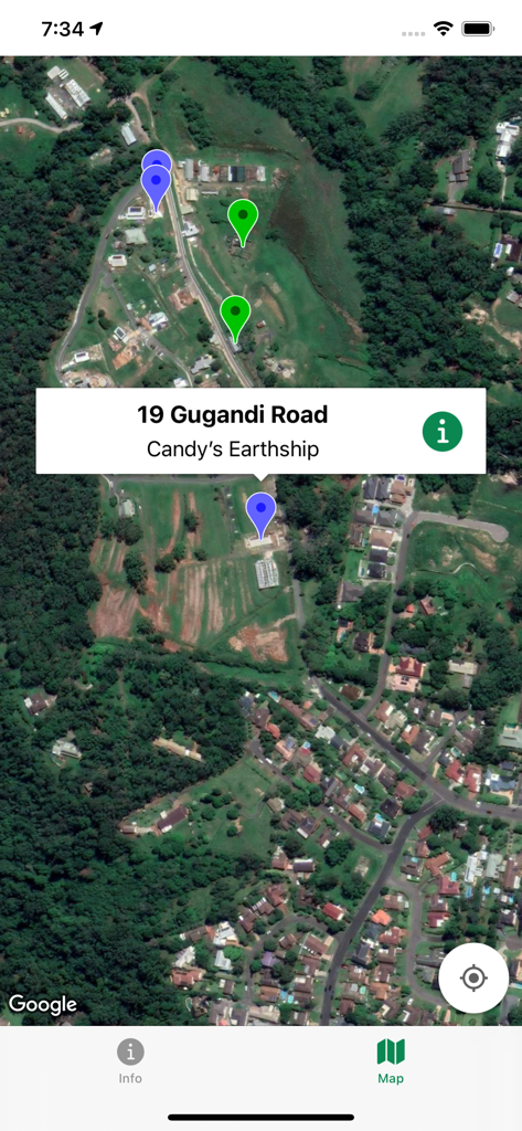 NEVigator - A satellite map view in the NEVigator app showing location pins for sustainable sites like Candy's Earthship in Narara Ecovillage.