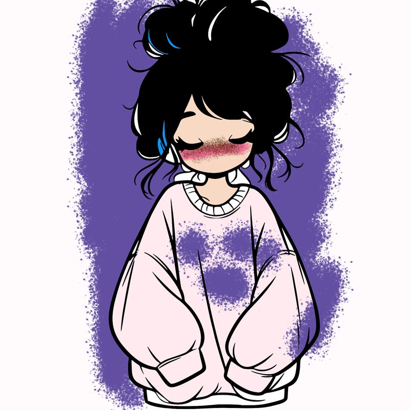 girl with baggy sweatshirt and messy bun