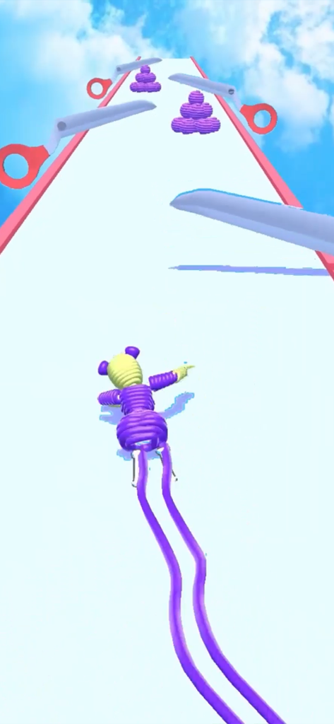 Rope Man: Monster Battle Run - Personaje de cuerda esquivando tijeras gigantes en una pista de atletismo