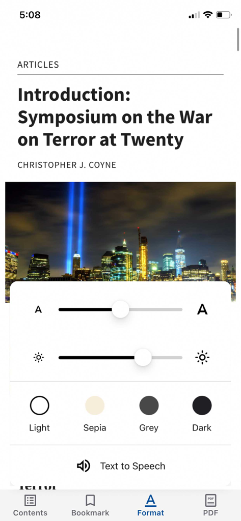 Reading format menu in the Independent Review app showing options for text size, brightness, and color themes like Light, Sepia, Grey, and Dark.