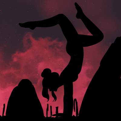 a woman doing a handstand