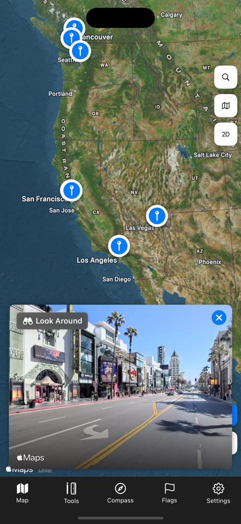 A satellite map interface showing the western United States with an interactive street view window overlay