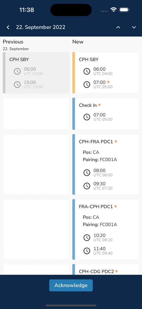 Pantalla móvil que muestra cambios en el calendario de vuelo con horarios anteriores y nuevos y un botón de reconocimiento.