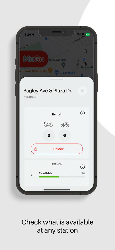 スマートフォン画面に、デトロイトのMoGoのリアルタイム自転車およびドック利用可能性を示すPBSCアプリが表示されています。
