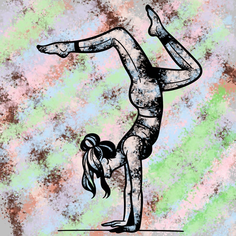 a woman doing a handstand