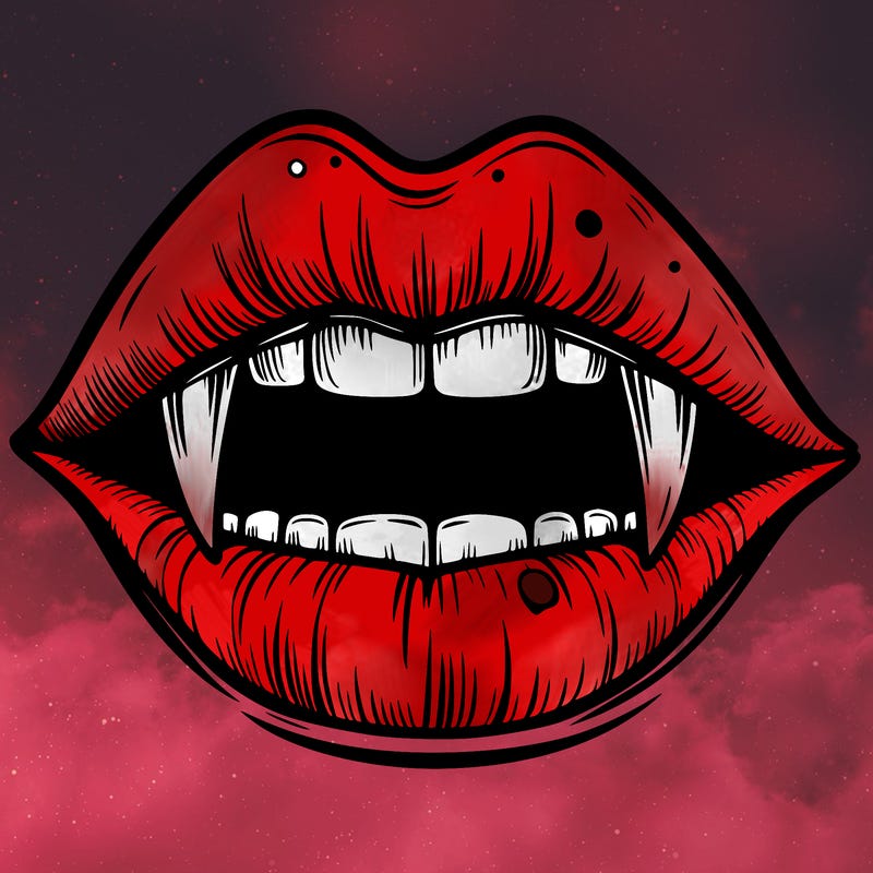 lips with vampire teeth