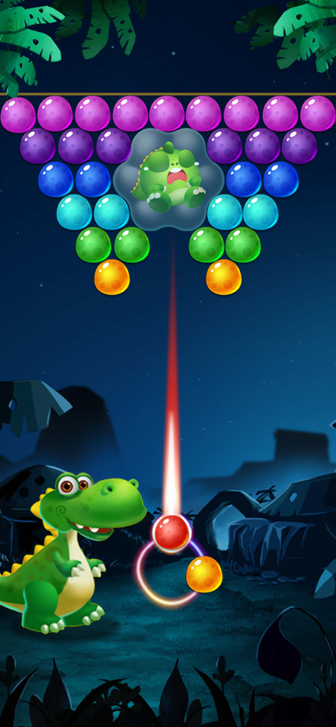 Un dinosauro punta un laser contro bolle colorate per salvare un draghetto