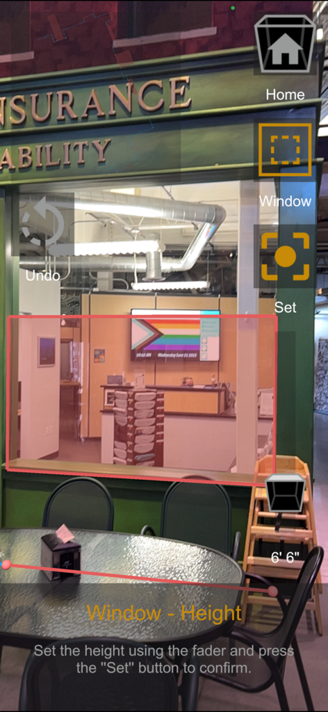 A3d Scanner 앱의 증강 현실 인터페이스가 실제 공간의 창 높이를 매핑하고 있습니다.