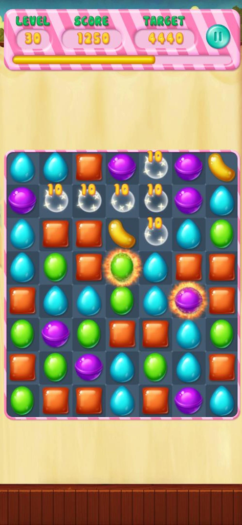 Candy Rescue Frenzy のカラフルなマッチ3パズルボード。さまざまなキャンディーとレベル進行バーを表示。