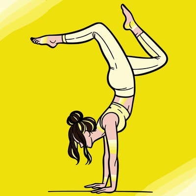 a woman doing a handstand