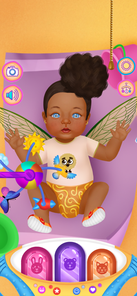 Baby Dress Up & Daycare Game 2 - A baby with fairy wings wearing a bird t-shirt and playing with a mobile toy in a daycare game