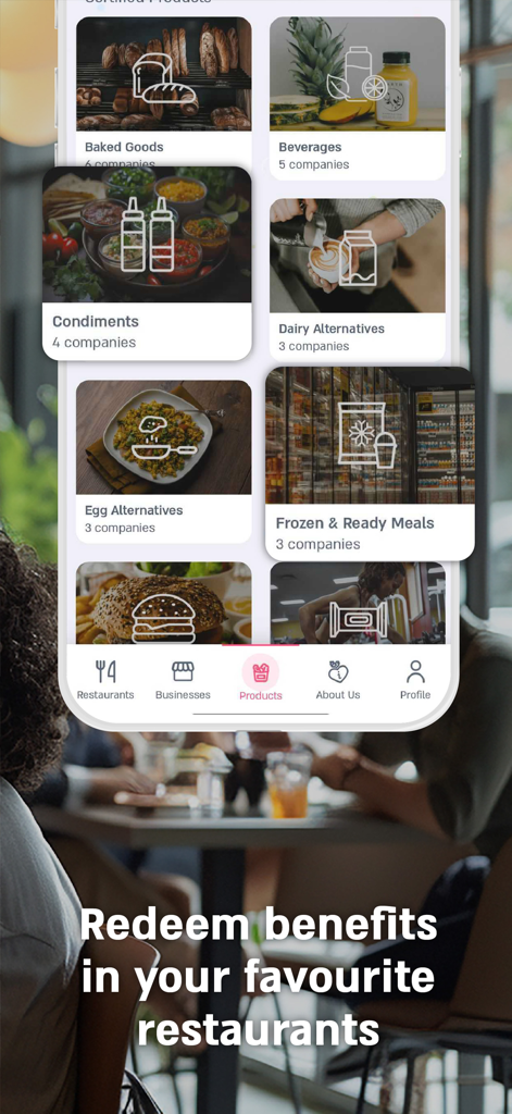 Vegan Friendly - Vegan Friendly app interface showing certified product categories like baked goods and dairy alternatives with a call to redeem benefits.