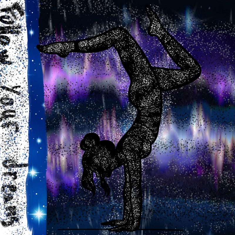 a woman doing a handstand