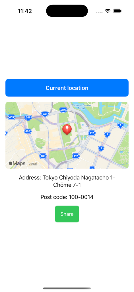 Interfaz de la aplicación Here Address Here mostrando la dirección y el código postal actuales con vista de mapa y botón para compartir