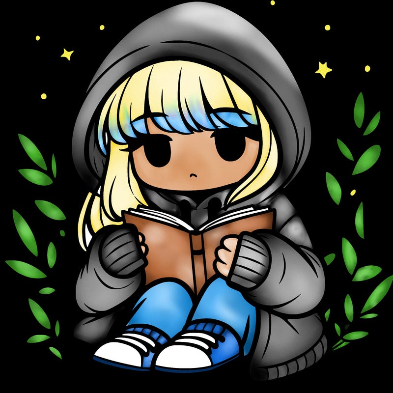 girl in oversized hoodie reading a book