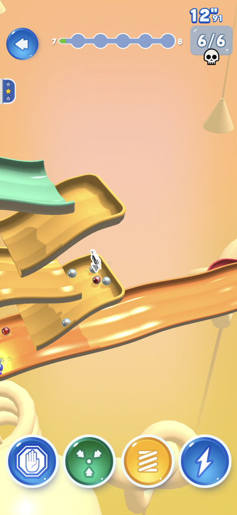 A marble racing game screen showing multiple marbles competing on a 3D track with strategic power up buttons at the bottom