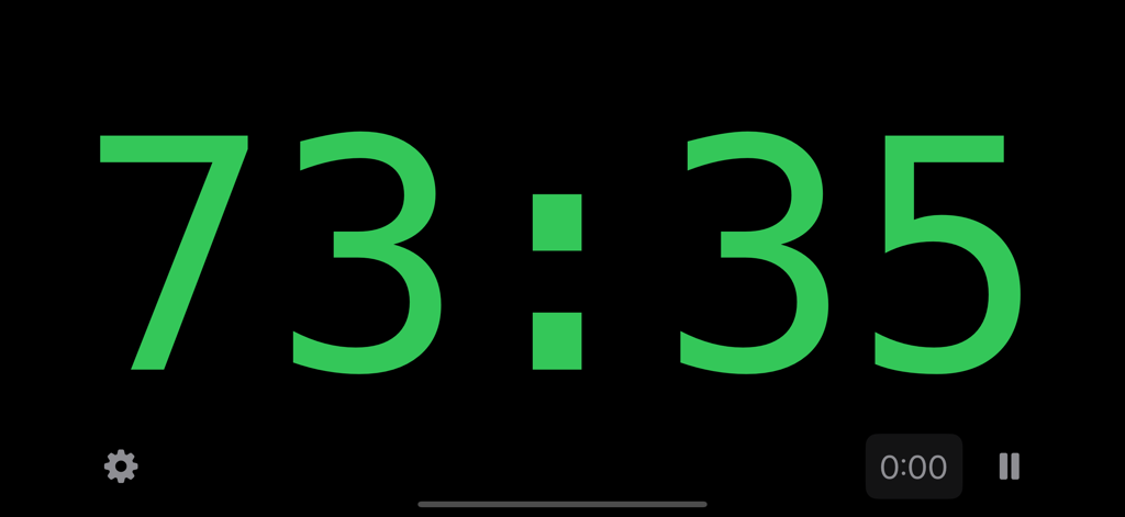 Pace Clock - A minimalist digital pace clock interface showing large green digits on a black background for high visibility during workouts