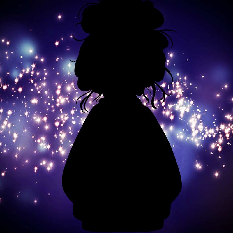 girl with baggy sweatshirt and messy bun