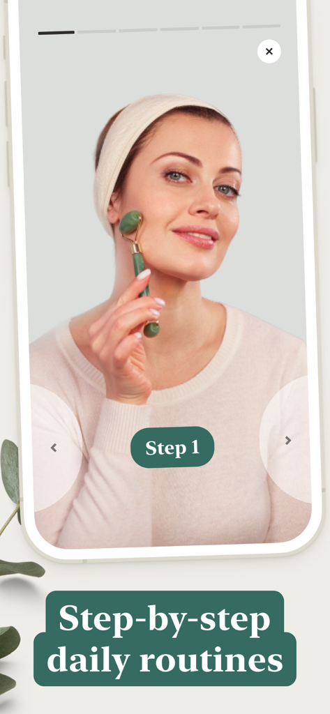 Woman using a jade roller for a step by step face yoga routine in the Mimika app