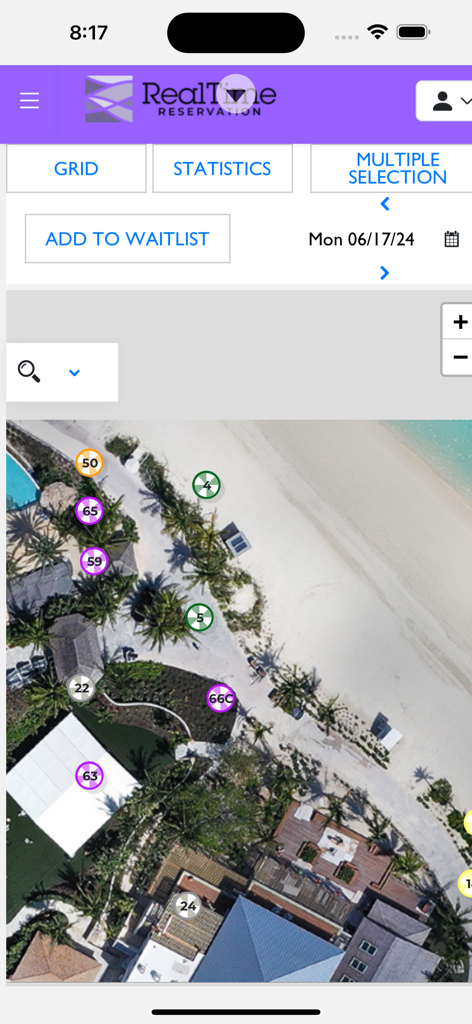 Aerial map of resort amenities showing numbered reservation spots for beach and pool areas