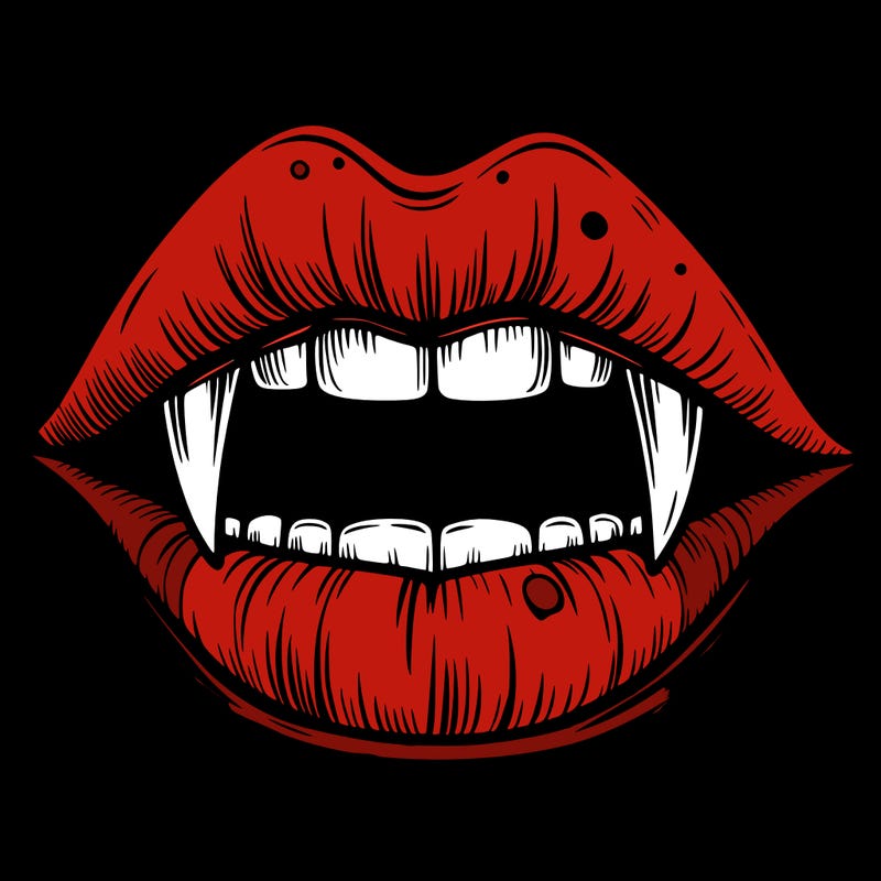 lips with vampire teeth