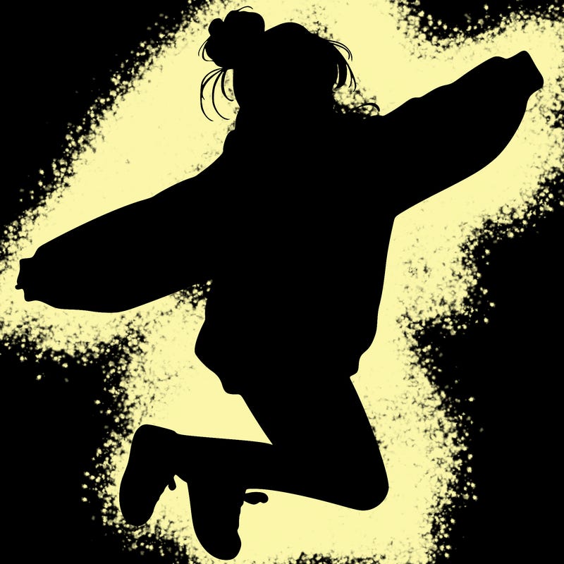 realistic girl jumping with a bun and oversized sweatshirt
