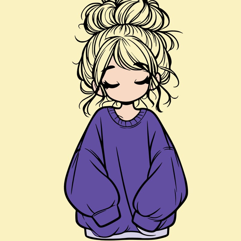 girl with baggy sweatshirt and messy bun