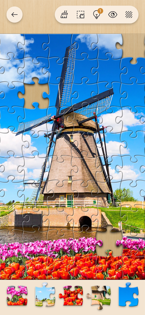 Jigsawscapes® - Jigsaw Puzzles - Un puzzle digitale a incastro di un mulino a vento tradizionale e fiori colorati in Jigsawscapes