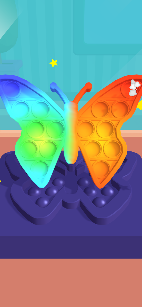 A colorful butterfly pop it toy being created in the Fidget Toy Maker app simulation