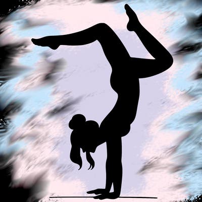a woman doing a handstand