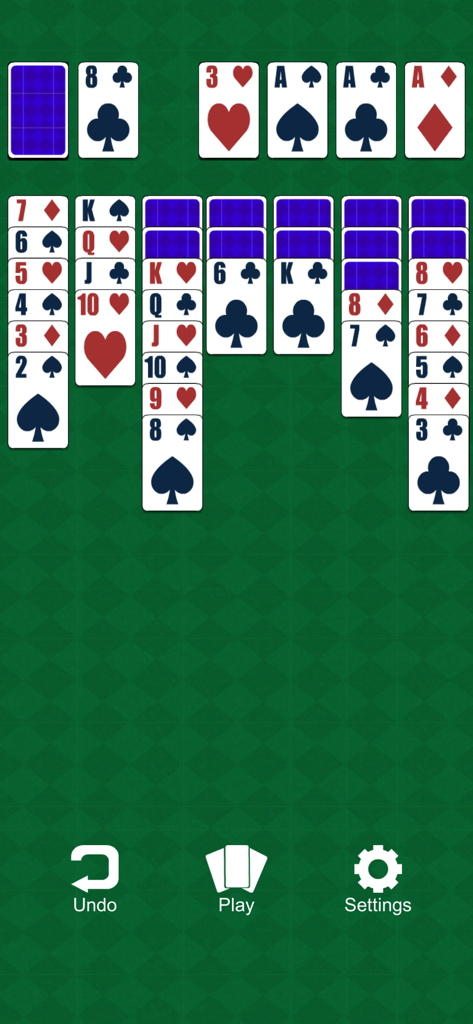Klondike Kings Solitaire - A game of classic Klondike Solitaire in progress on a green diamond pattern background