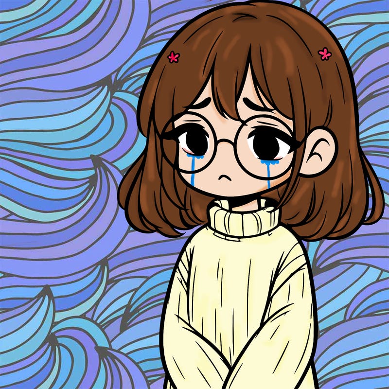 sad girl with glasses in a sweater