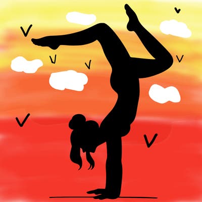 a woman doing a handstand