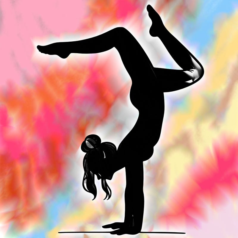 a woman doing a handstand