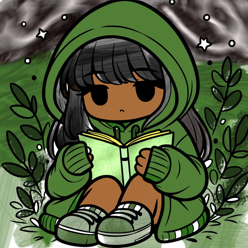 girl in oversized hoodie reading a book