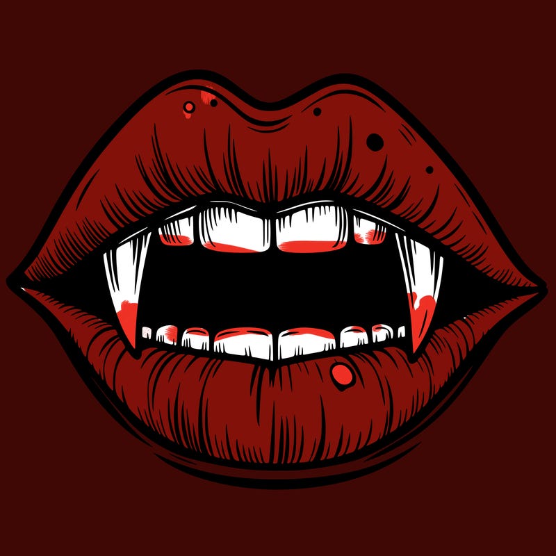 lips with vampire teeth