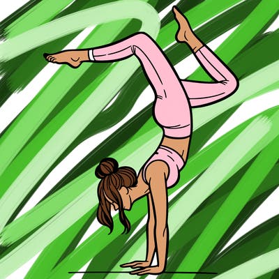 a woman doing a handstand