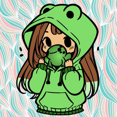 a girl holding a froggy hoodie