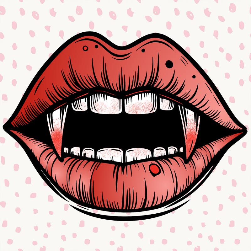 lips with vampire teeth