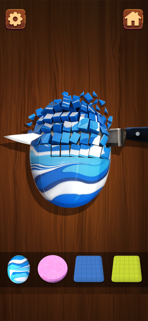 Mini Relaxing Game - pop it - A knife slicing through a blue and white textured block in an ASMR fidget game