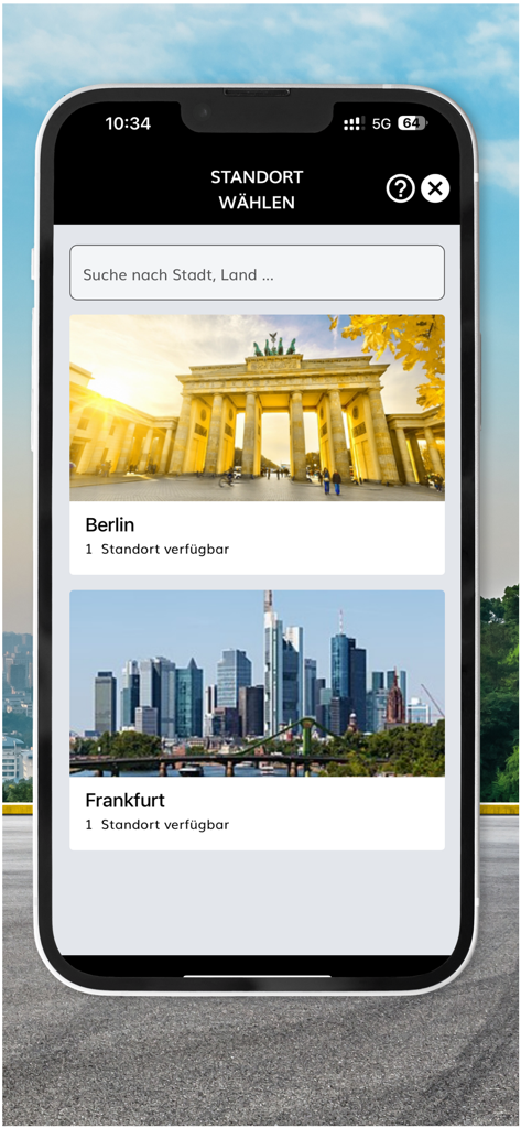 Hertz 24/7® Mobility - Pantalla de la aplicación Hertz 24/7 Movilidad para elegir una ubicación de alquiler de coches en Berlín o Frankfurt