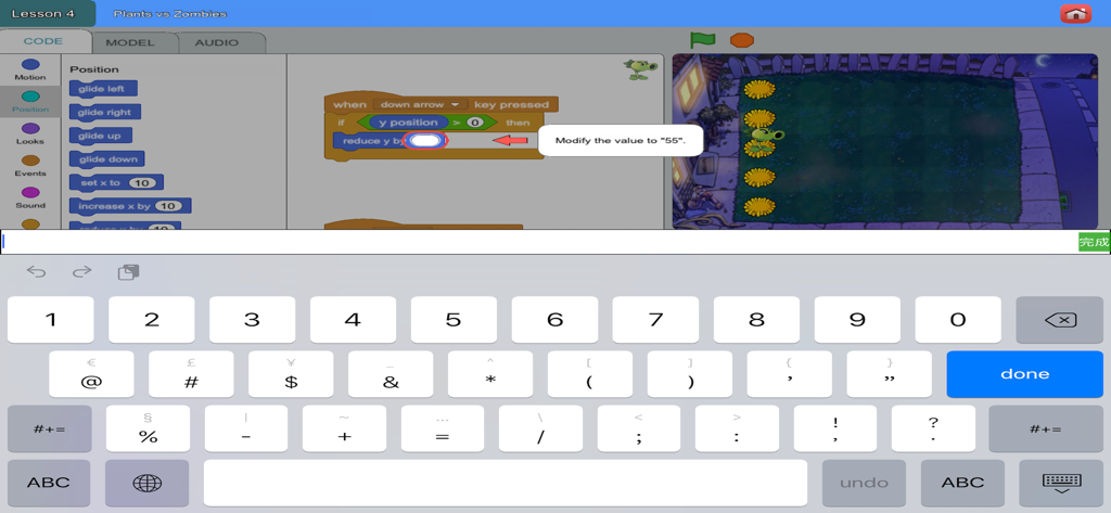 A tablet screen showing a Scratch coding lesson for kids with block programming and a virtual keyboard