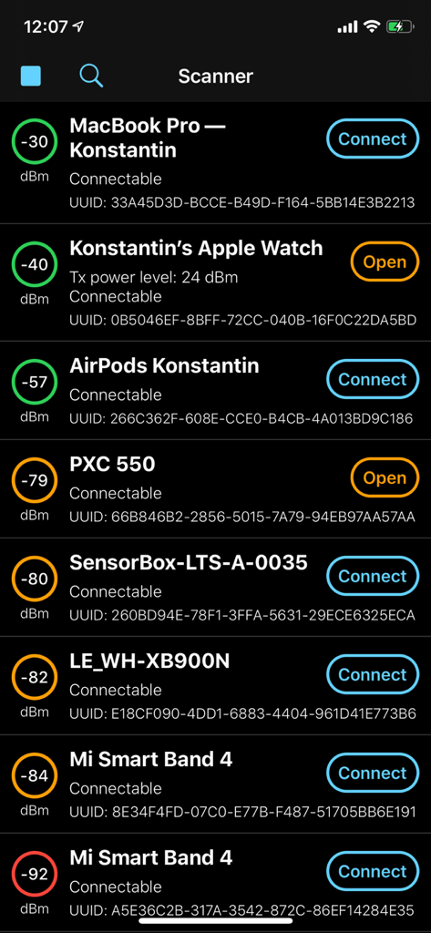 BLE Scanner app interface showing a list of nearby Bluetooth devices with signal strength and UUIDs