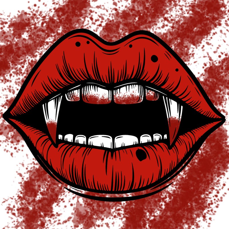lips with vampire teeth