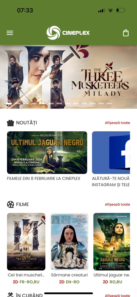 Home screen of the Cineplex app displaying movie posters for The Three Musketeers and other featured releases.