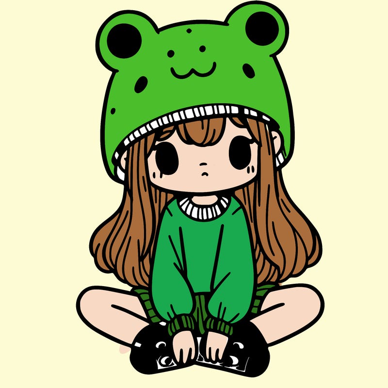 a girl wearing a frog hat and some frog socks