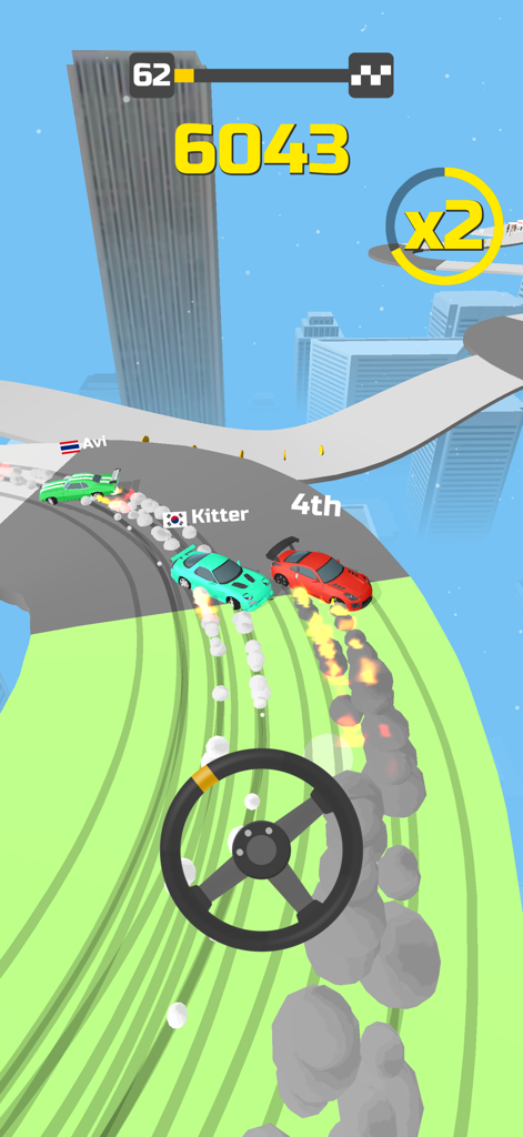 Top down view of colorful cars drifting on a curved track high above a city with steering wheel controls.