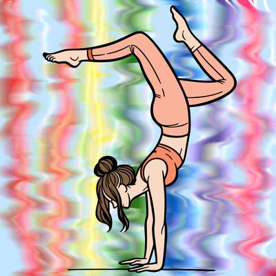 a woman doing a handstand