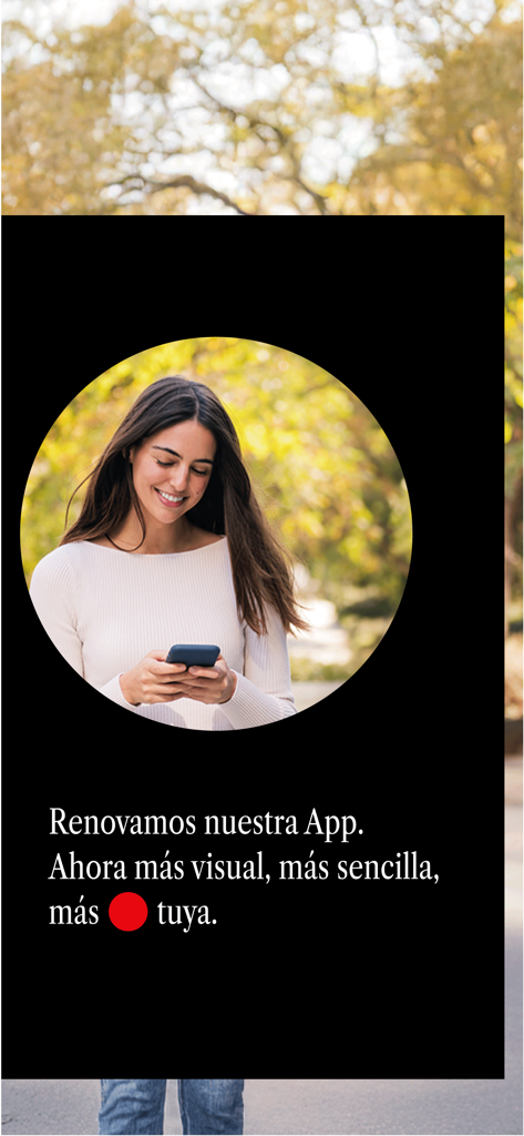 Kutxabank - A woman smiling while using her smartphone with the Kutxabank app welcome text in Spanish